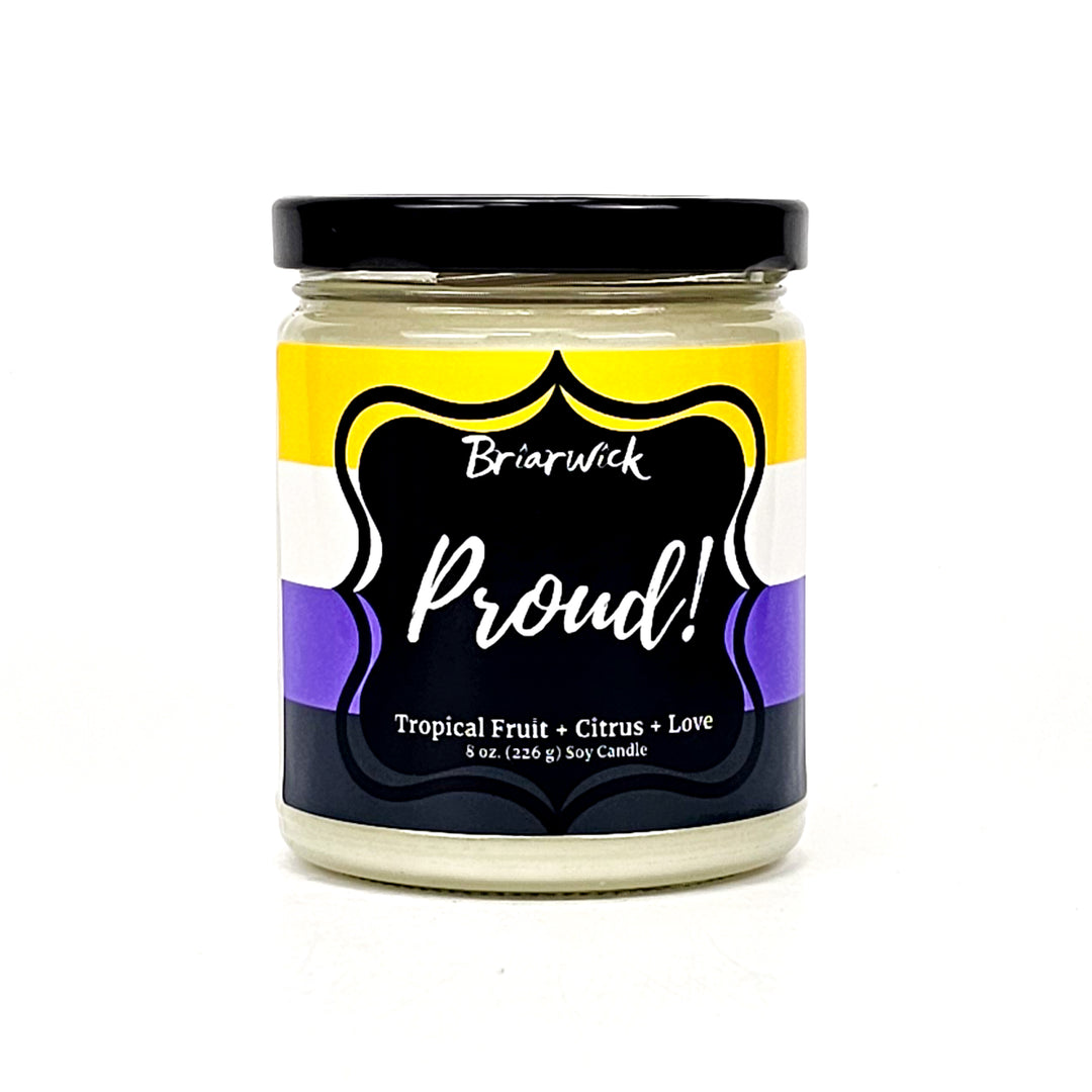 PROUD! 8oz white candle with nonbinary pride flag on a white background
