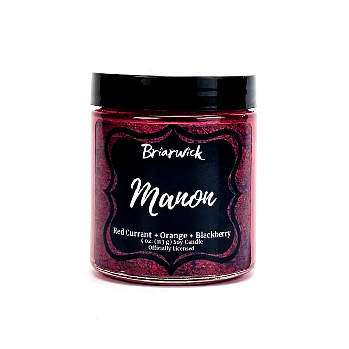 Manon 4oz scarlet candle with red textured design on a white background