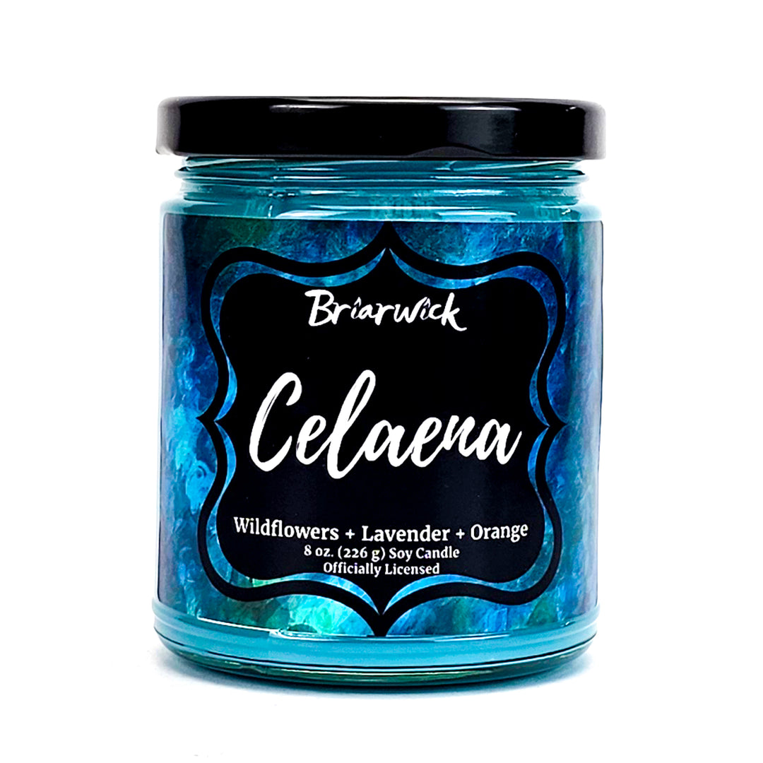 Celaena 8oz teal candle with blue textured design on a white background