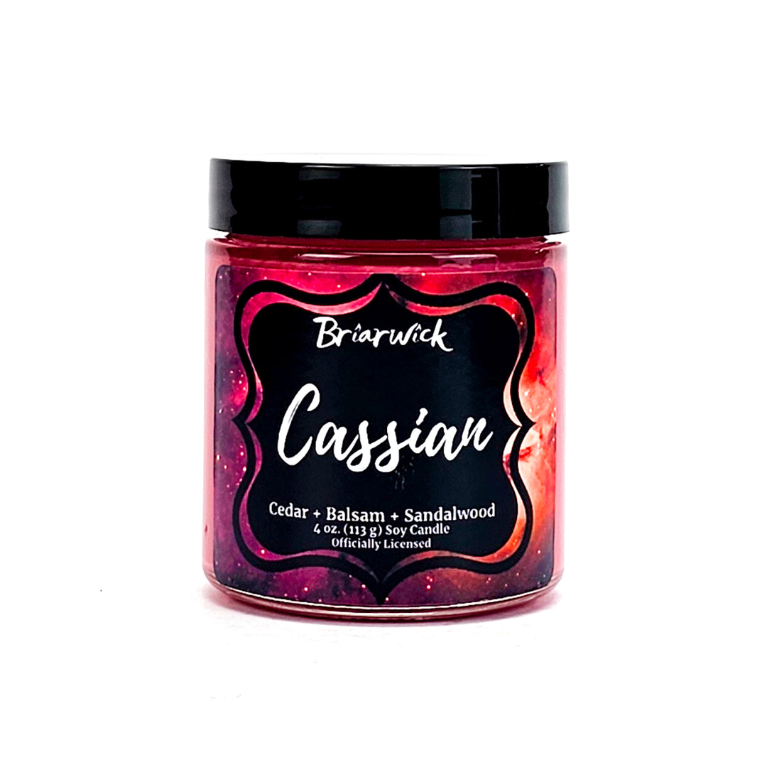 Cassian 4oz crimson candle with red galaxy design on a white background