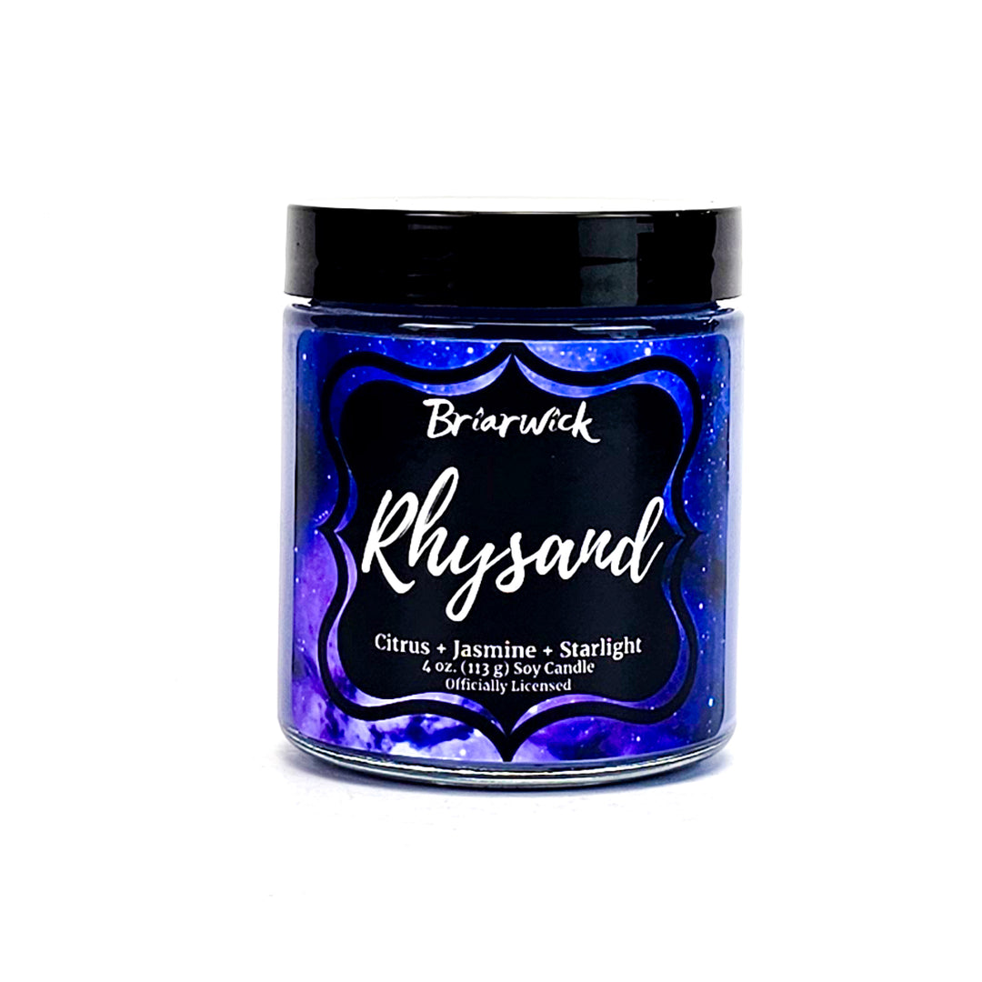 Rhysand 4oz purple candle with purple galaxy design on a white background