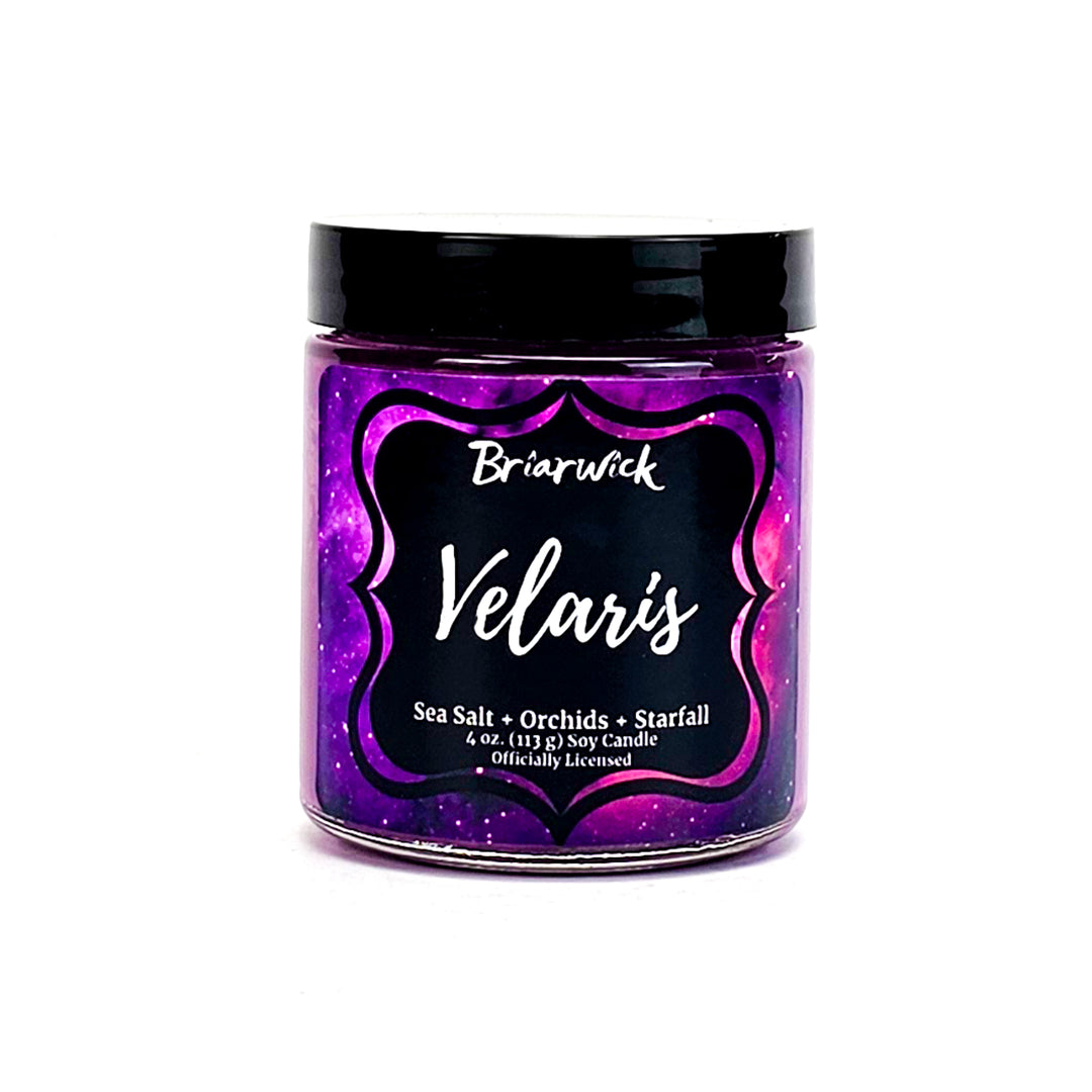 Velaris 4oz violet candle with purple galaxy design on a white background