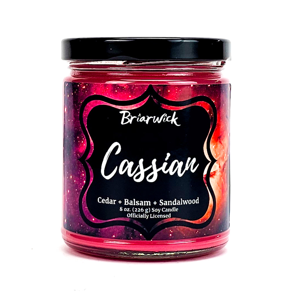Cassian 8oz crimson candle with red galaxy design on a white background