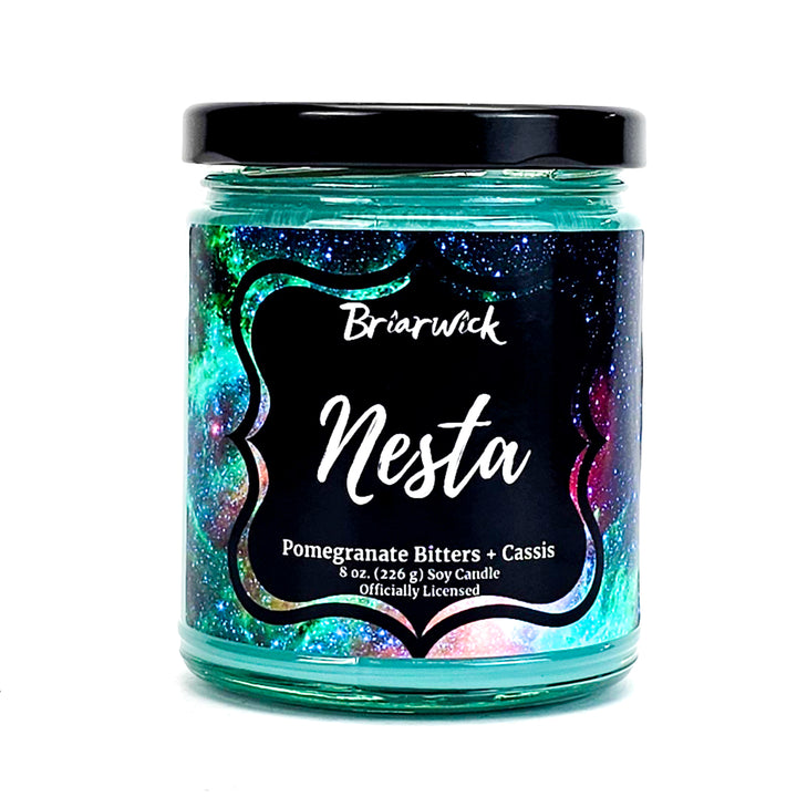 Nesta 8oz turquoise candle with turquoise galaxy design on a white background