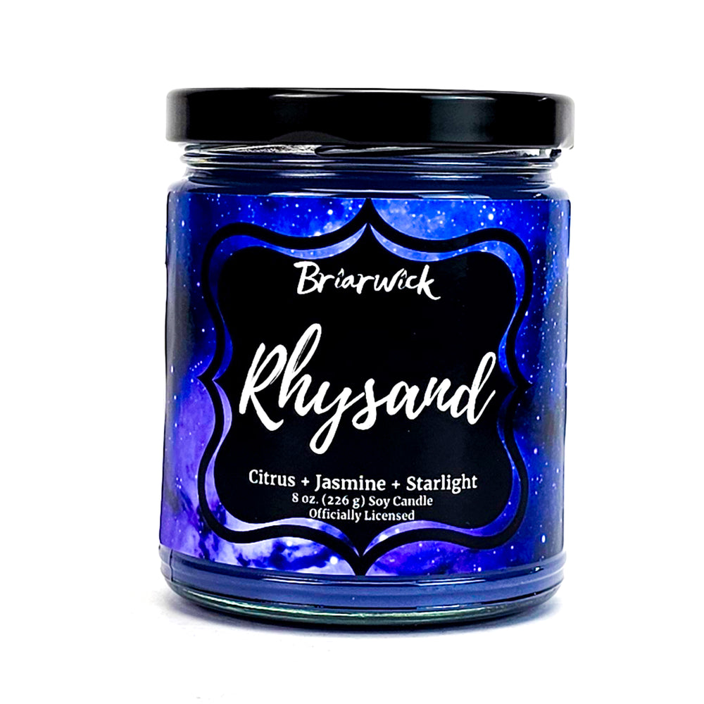 Rhysand 8oz purple candle with purple galaxy design on a white background