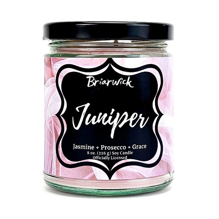 a jar of jujuper sitting on a white surface