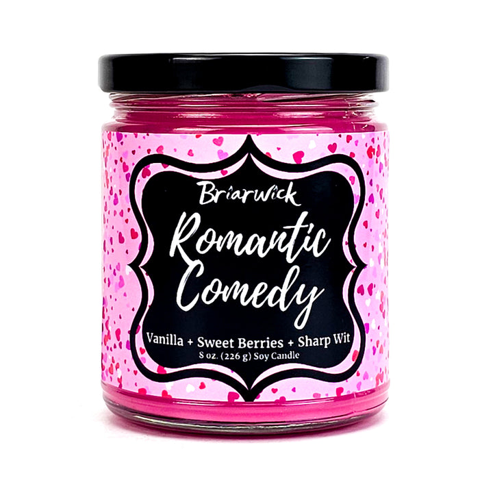 a jar of pink and black confetti candy