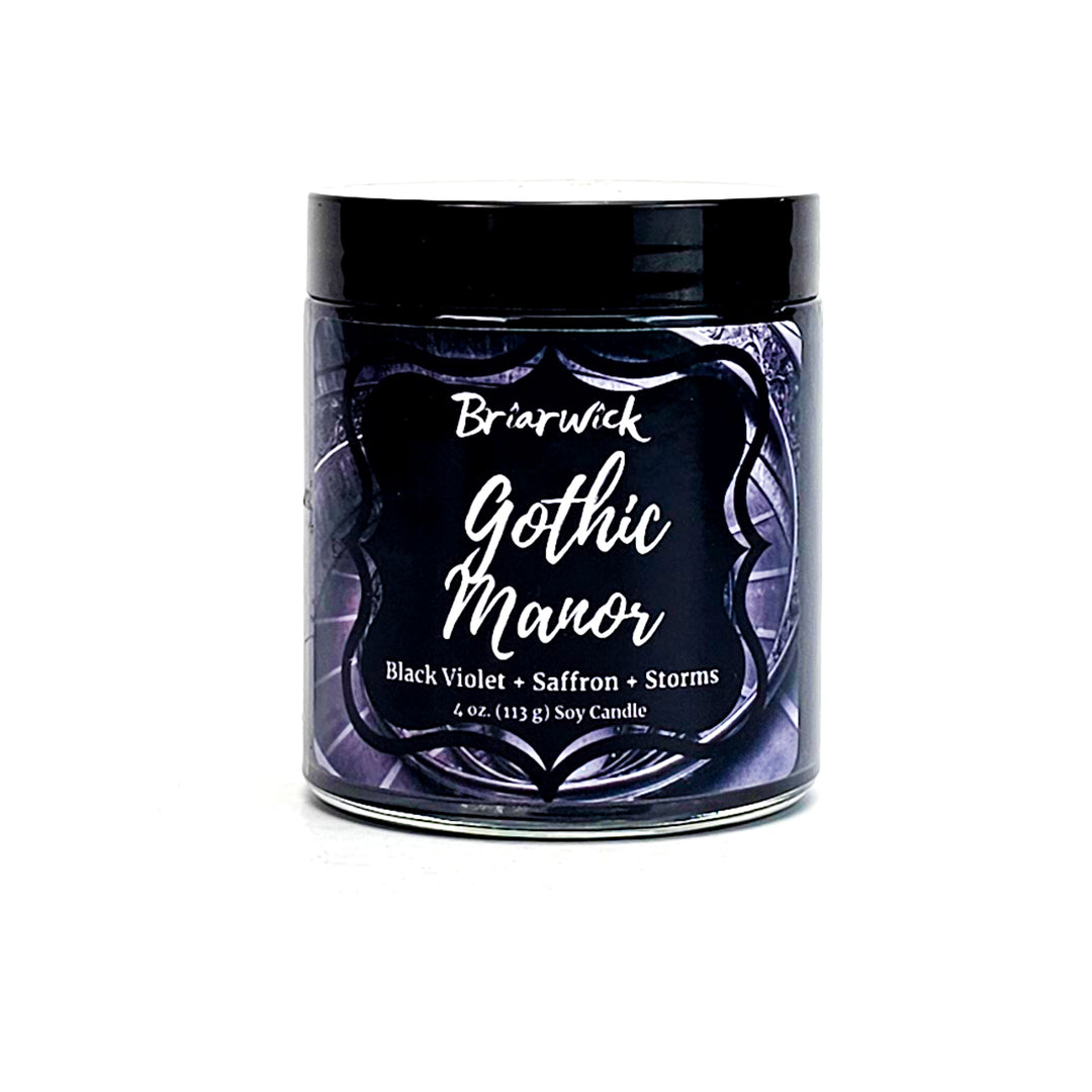 Gothic Manor 4oz charcoal candle with black stairwell design on a white background