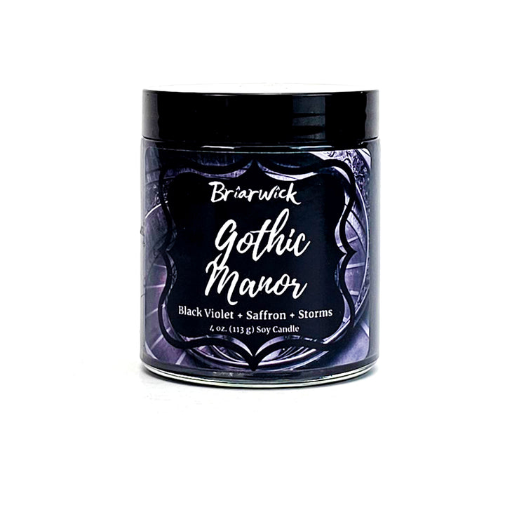 Gothic Manor 4oz charcoal candle with black stairwell design on a white background
