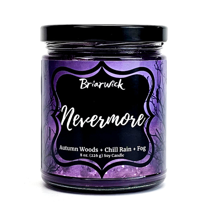 Nevermore 8oz plum candle with purple night sky design on a white background