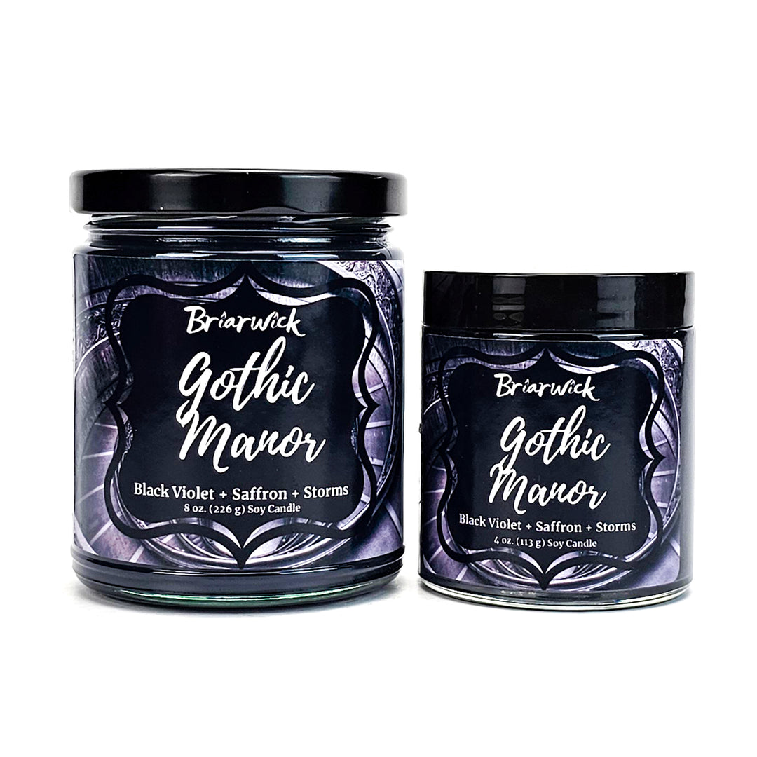 Gothic Manor 8oz & 4oz charcoal candles with black stairwell designs on a white background