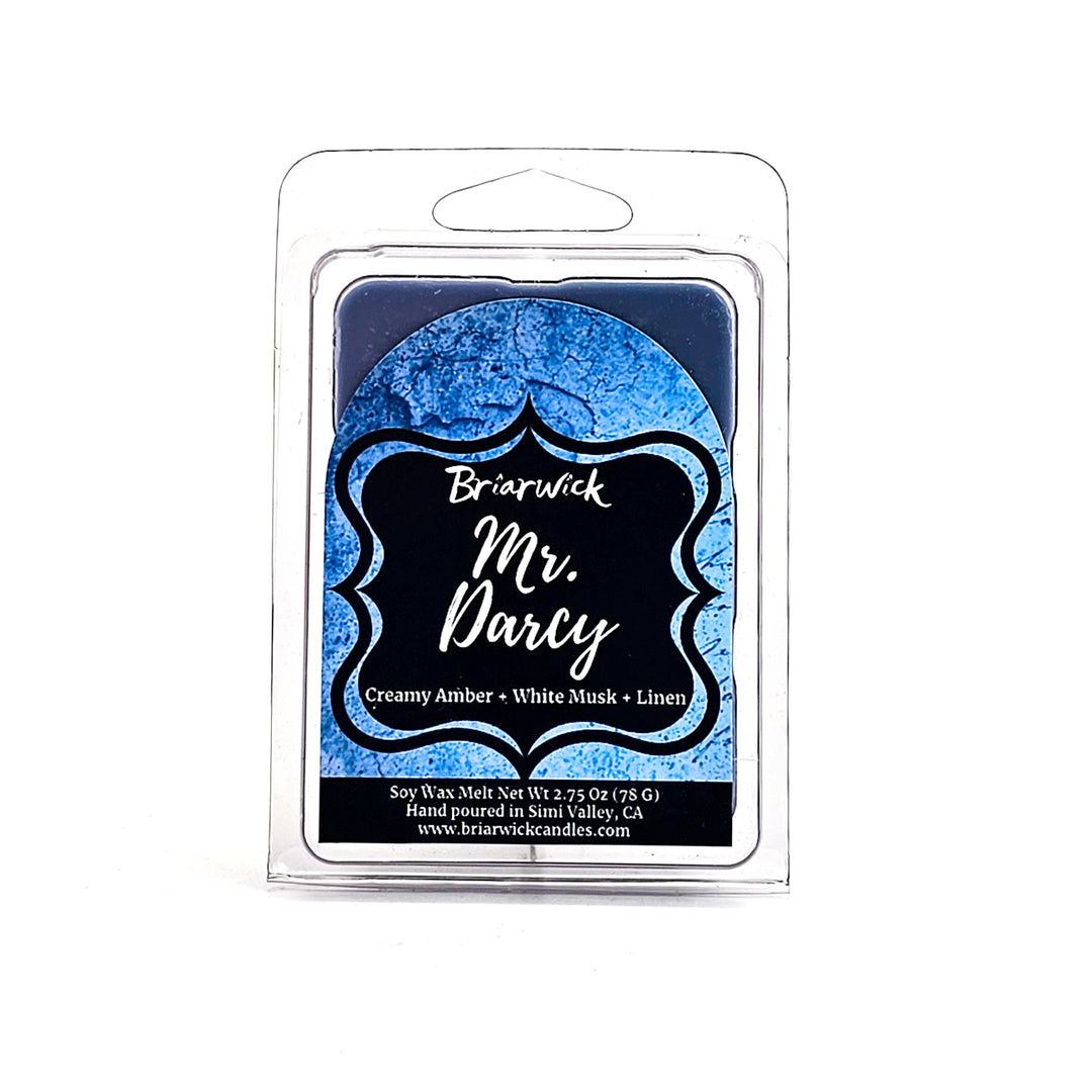 Mr. Darcy 2oz steel blue Wax Melt with blue parchment design on a white background