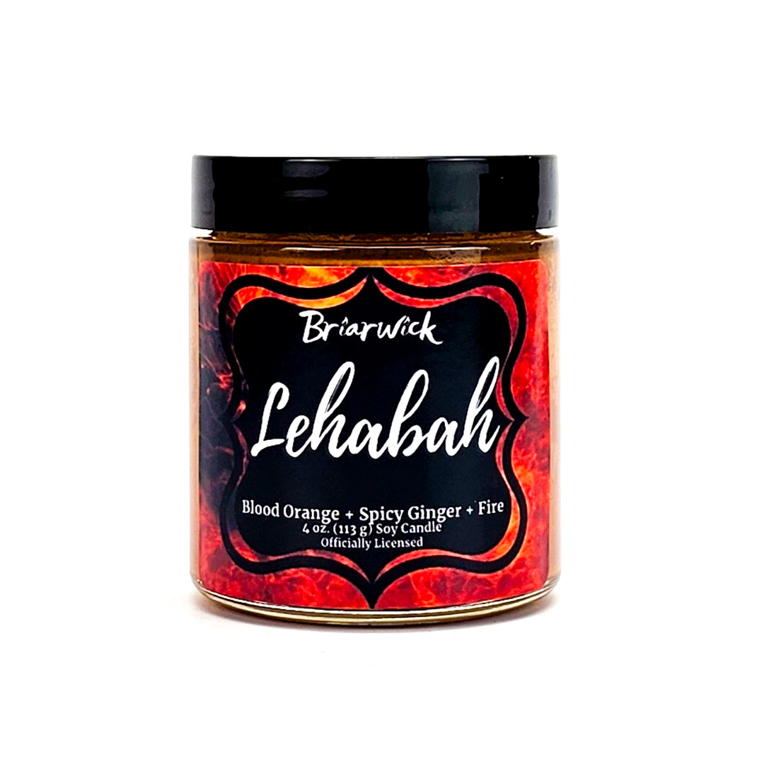 Lehabah 4oz copper candle with orange flame design on a white background