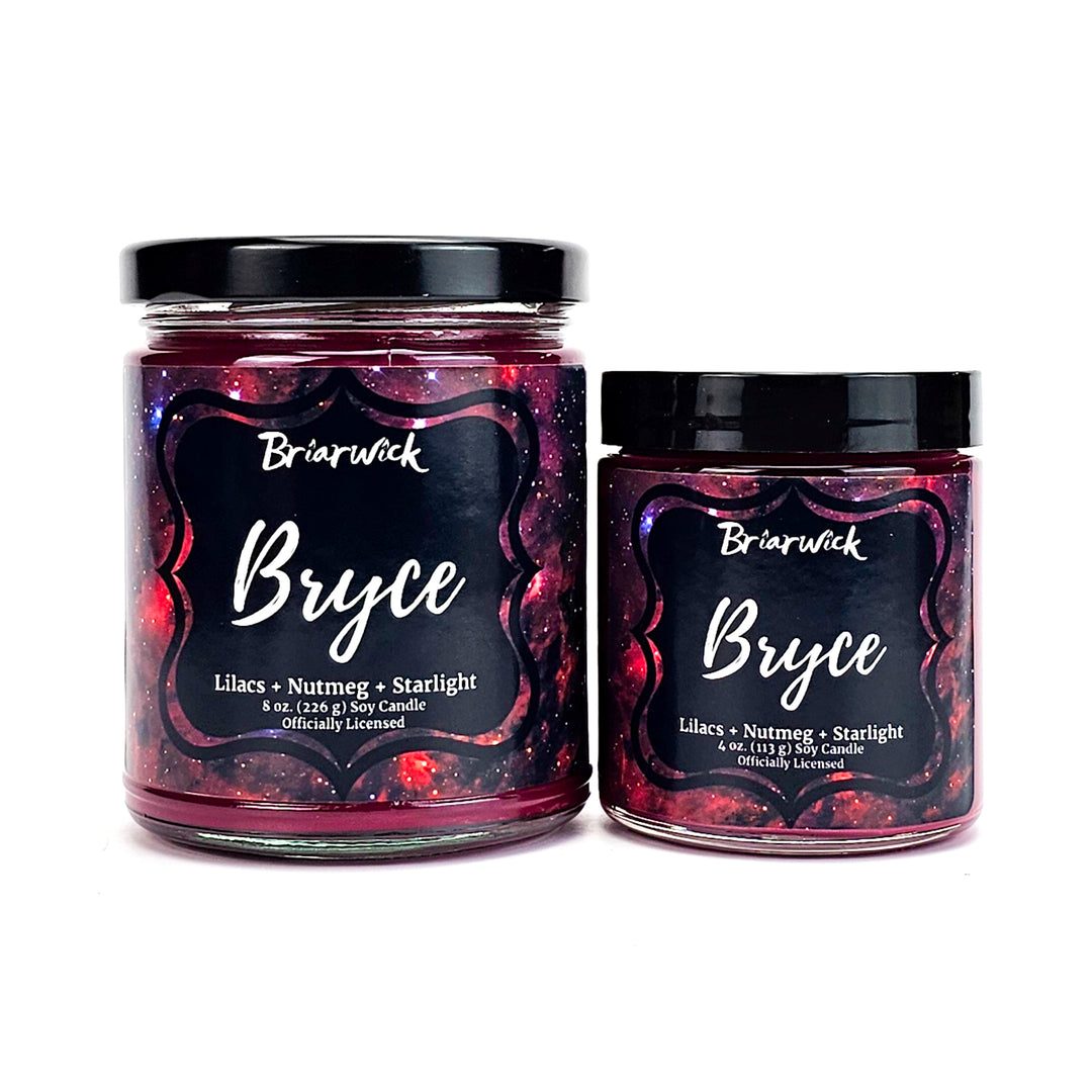 Bryce 8oz & 4oz maroon candles with red galaxy designs on a white background