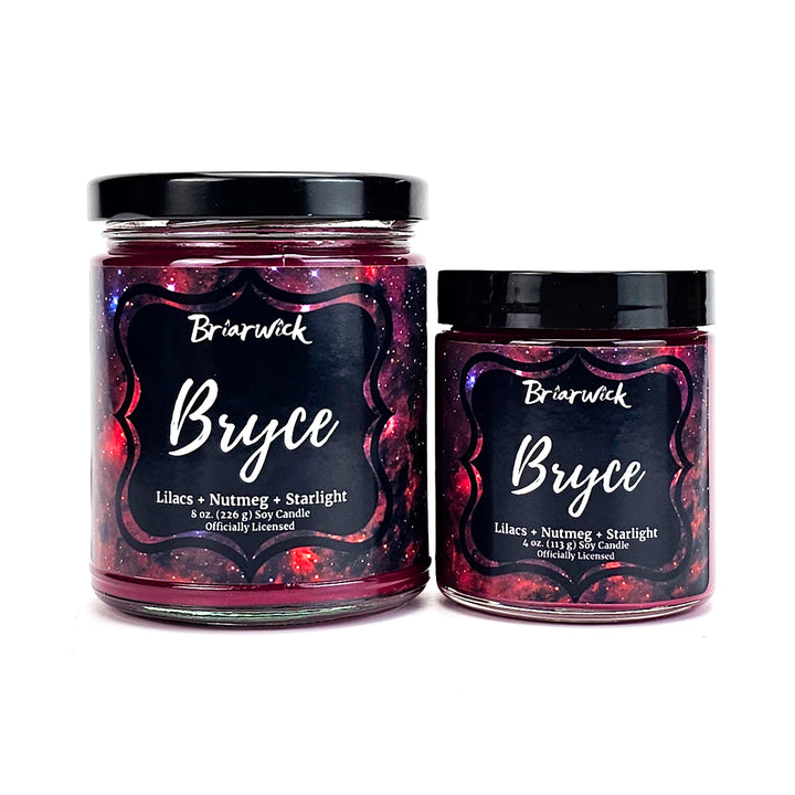 Bryce 8oz & 4oz maroon candles with red galaxy designs on a white background