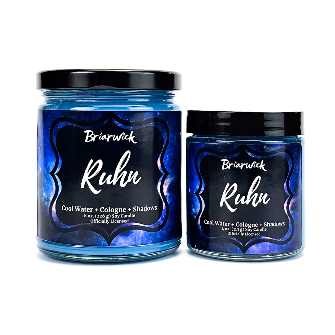 Ruhn 8oz & 4oz cerulean candle with blue galaxy design on a white background