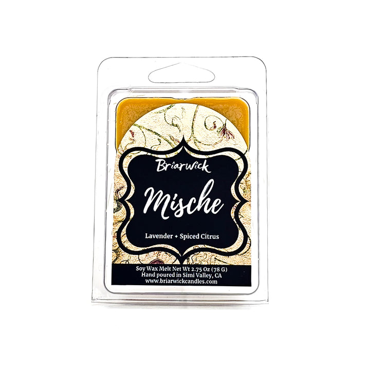 Mische 2oz custard yellow Wax Melt with yellow ornamental design on a white background