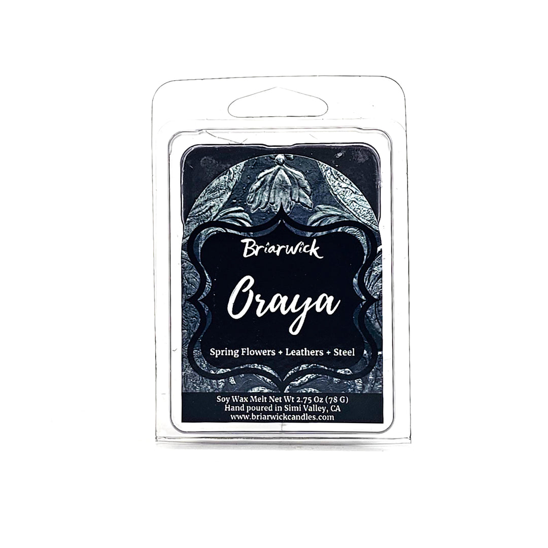 Oraya 2oz charcoal Wax Melt with black ornamental design on a white background