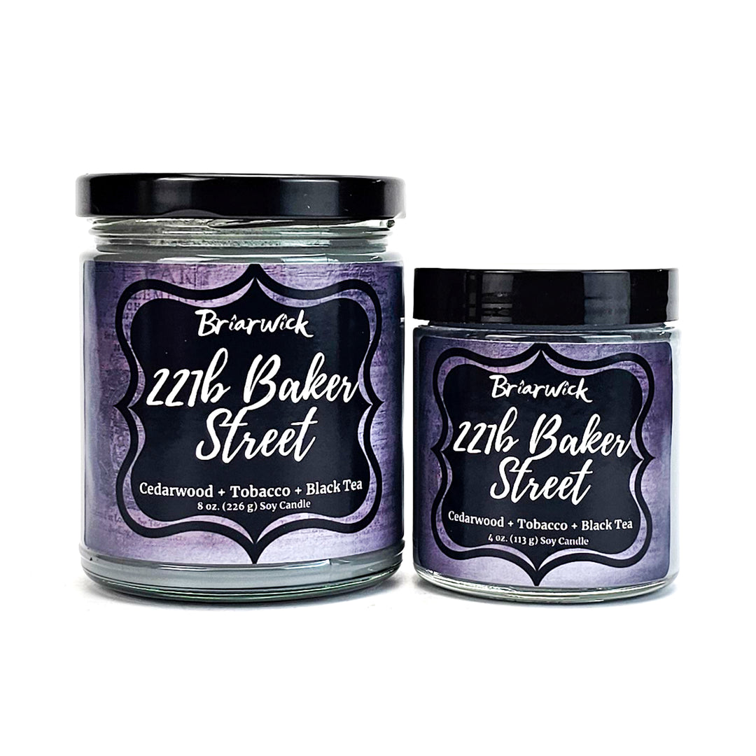 two jars of purple colored powder with black labels