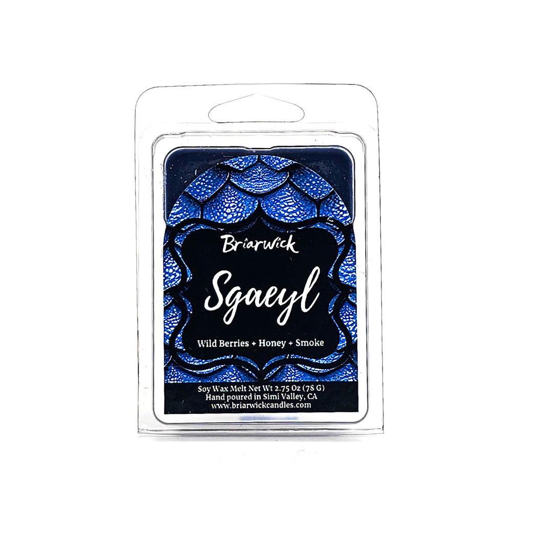 Sgaeyl 2oz navy Wax Melt with blue dragon scale design on a white background