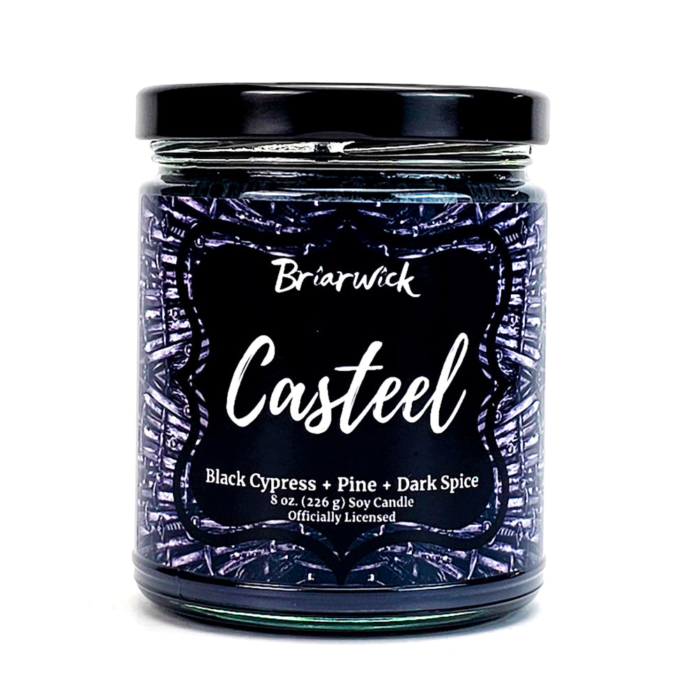 Casteel 8oz graphite candle with silver knife design on a white background