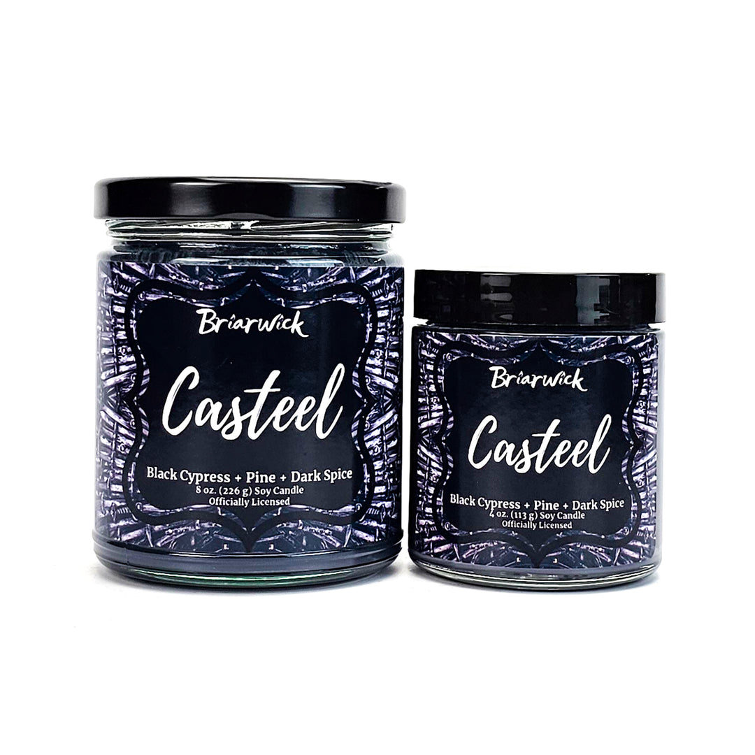 Casteel 8oz & 4oz graphite candles with silver knife designs on a white background