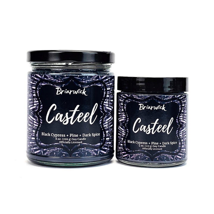 Casteel 8oz & 4oz graphite candles with silver knife designs on a white background