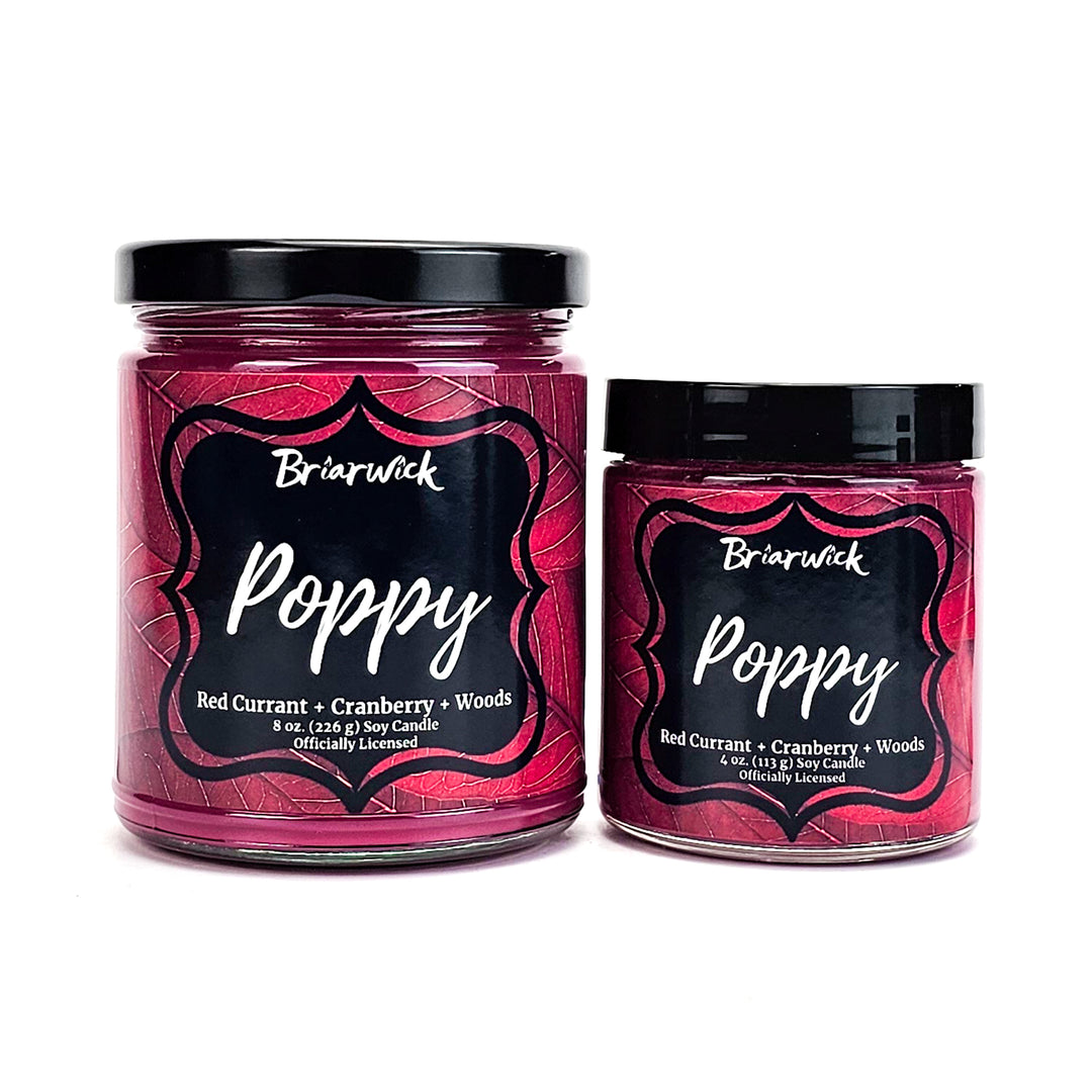 Poppy 8oz & 4oz burgundy candles with red leaf designs on a white background