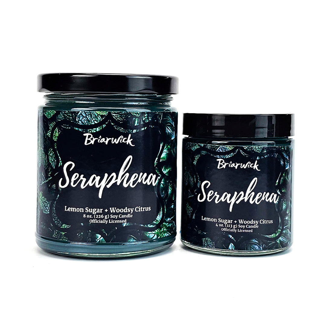 Seraphena 8oz & 4oz dark olive candles with green leaf designs on a white background