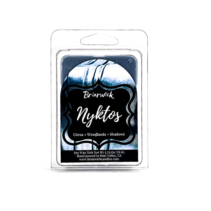 Nyktos 2oz flint gray Wax Melt with black & white textured design on a white background