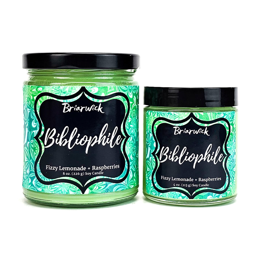 Bibliophile 8oz & 4oz key lime candles with green patterned designs on a white background