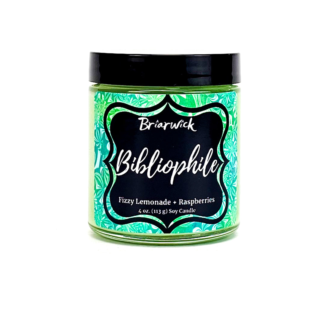 Bibliophile 4oz key lime candle with green patterned design on a white background