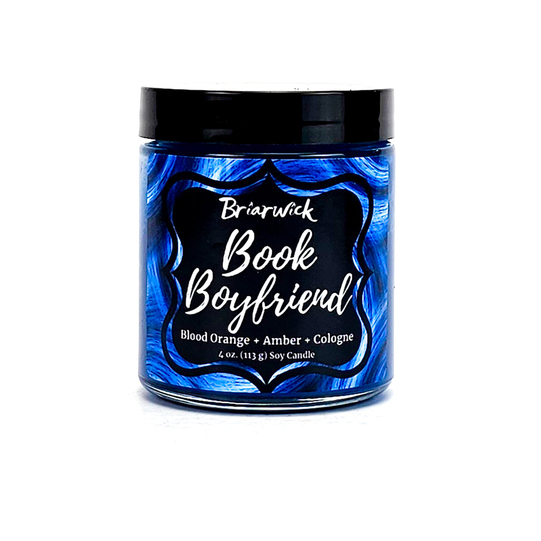 Book Boyfriend 4oz lapis candle with blue swirl design on a white background