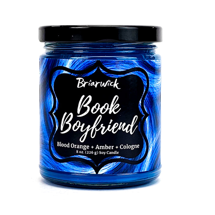 Book Boyfriend 8oz lapis candle with blue swirl design on a white background
