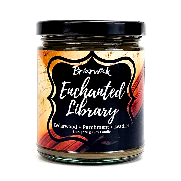 Enchanted Library 8oz brown candle with an open book design on a white background
