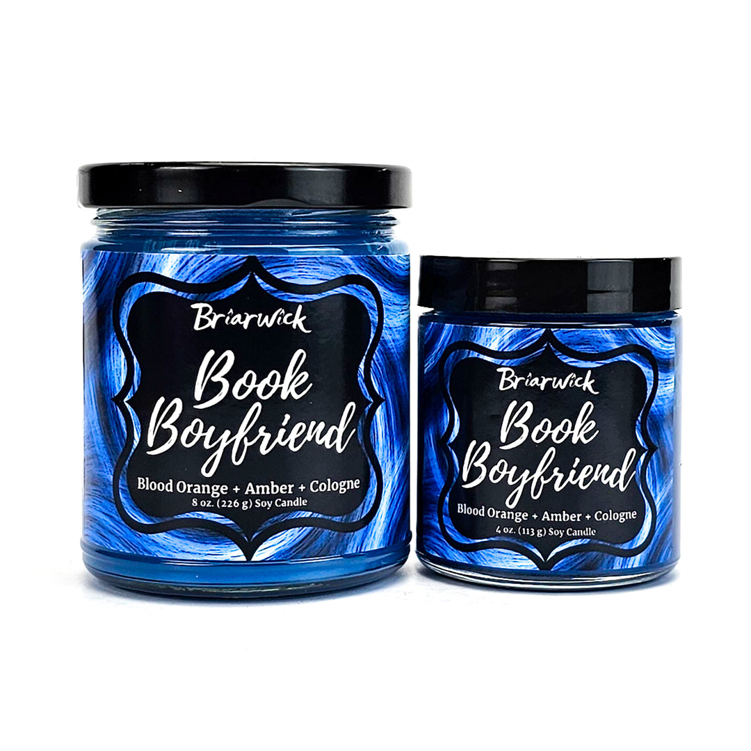 Book Boyfriend 8oz & 4oz lapis candles with blue swirl designs on a white background