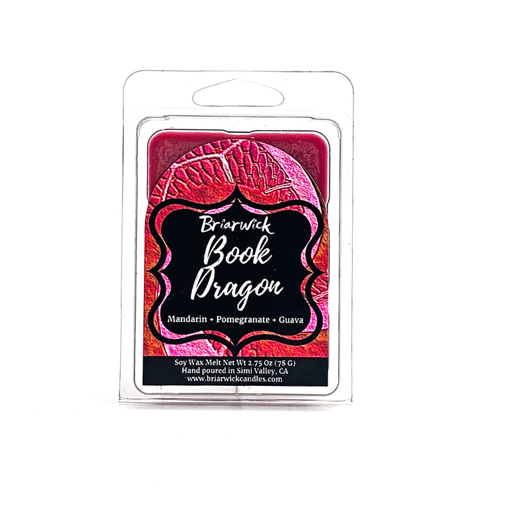 Book Dragon 2oz maroon Wax Melt with maroon scale design on a white background
