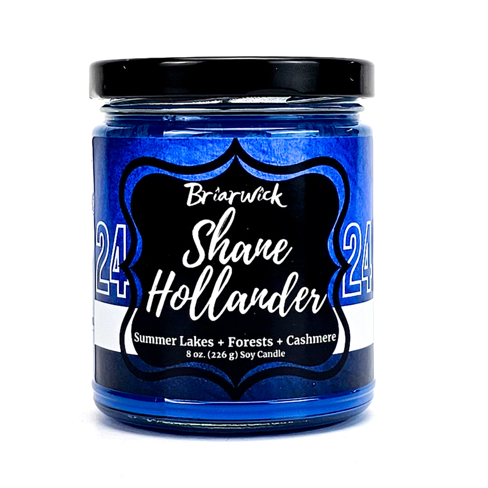 Shane Hollander 8oz lapis candle with blue hockey jersey design on a white background