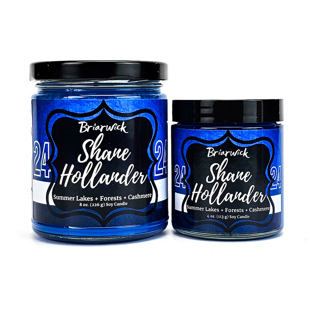 Shane Hollander 8oz & 4oz lapis candles with blue hockey jersey designs on a white background