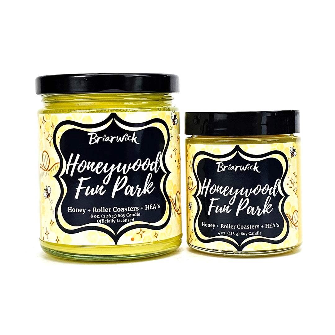 Honeywood Fun Park 8oz & 4oz  custard candles with yellow bee designs on a white background