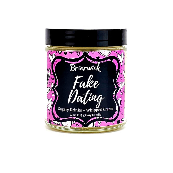 Fake Dating 4oz white candle with pink heart design on a white background