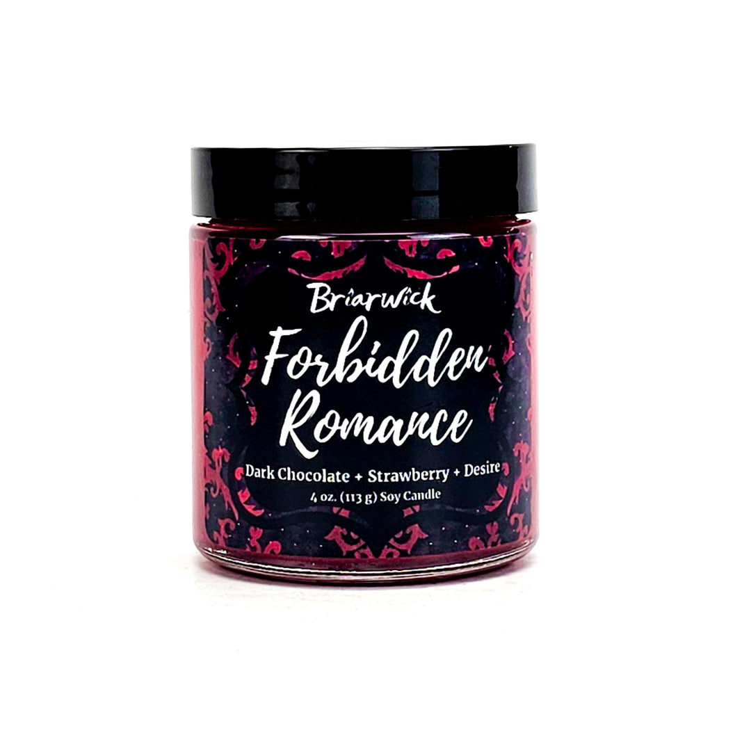 Forbidden Romance 4oz burgundy candle with red ornamental design on a white background