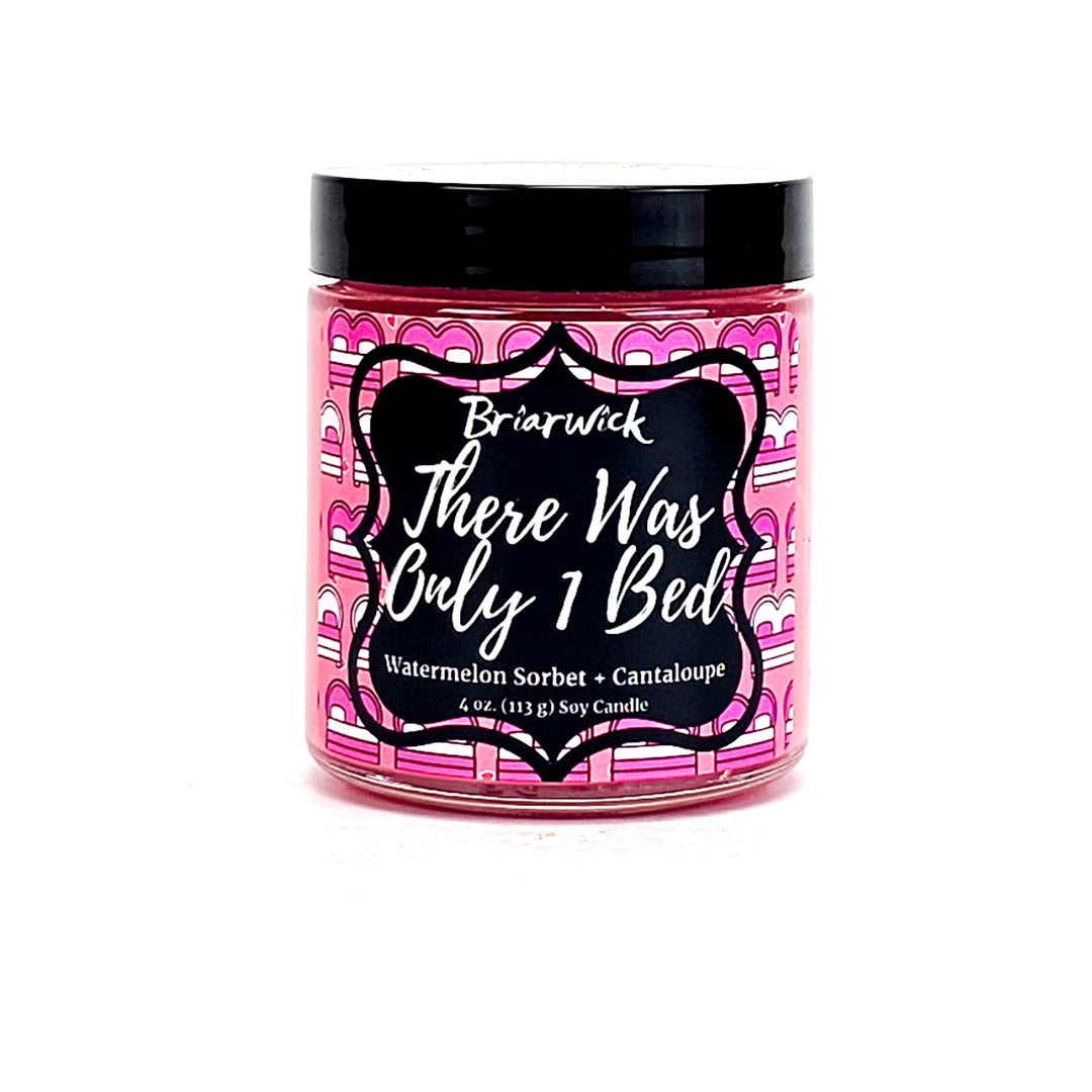 There Was Only 1 Bed 4oz bubblegum pink candle with pink bed design on a white background