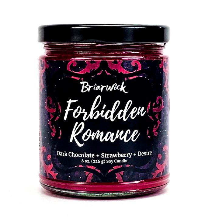 Forbidden Romance 8oz burgundy candle with red ornamental design on a white background