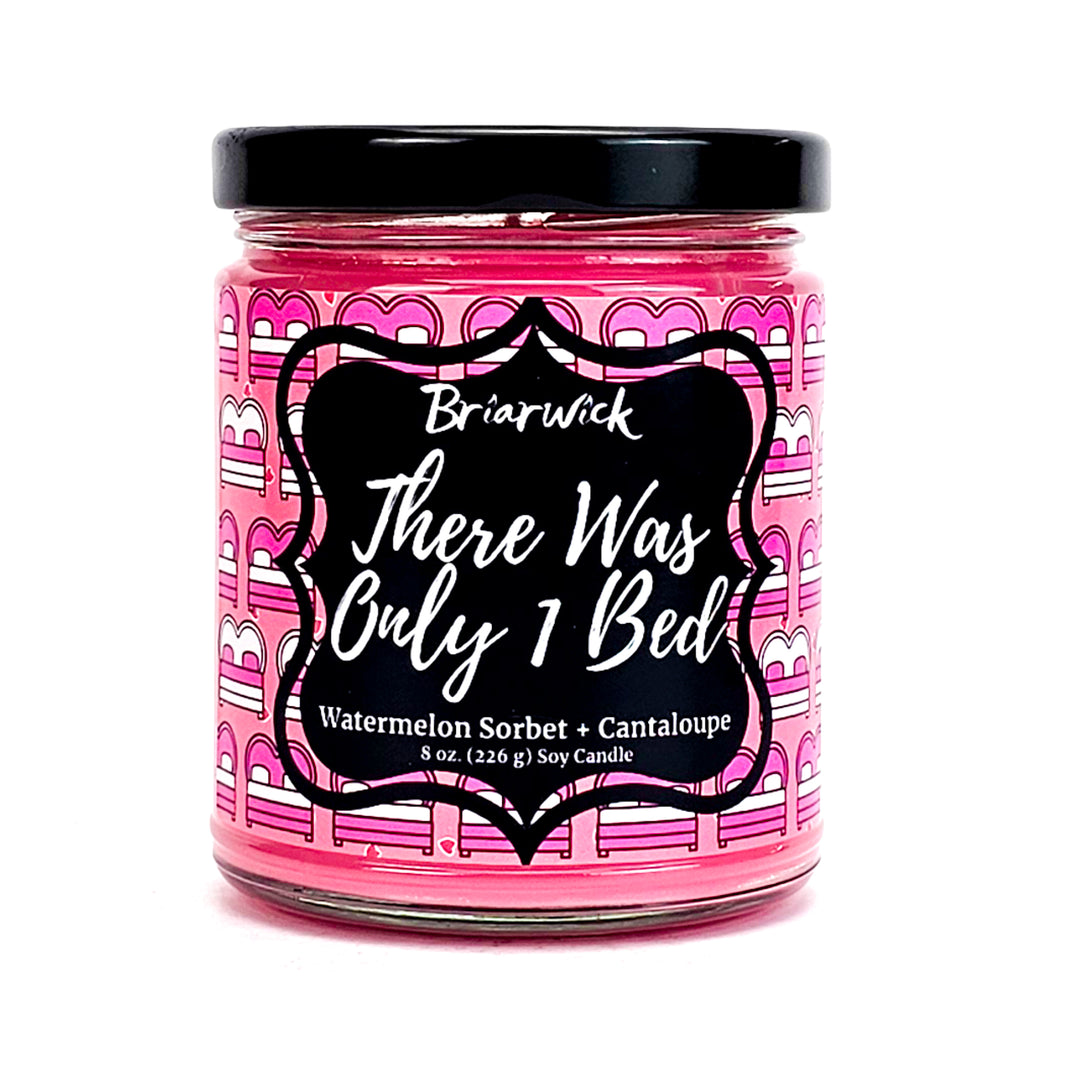 There Was Only 1 Bed 8oz bubblegum pink candle with pink bed design on a white background