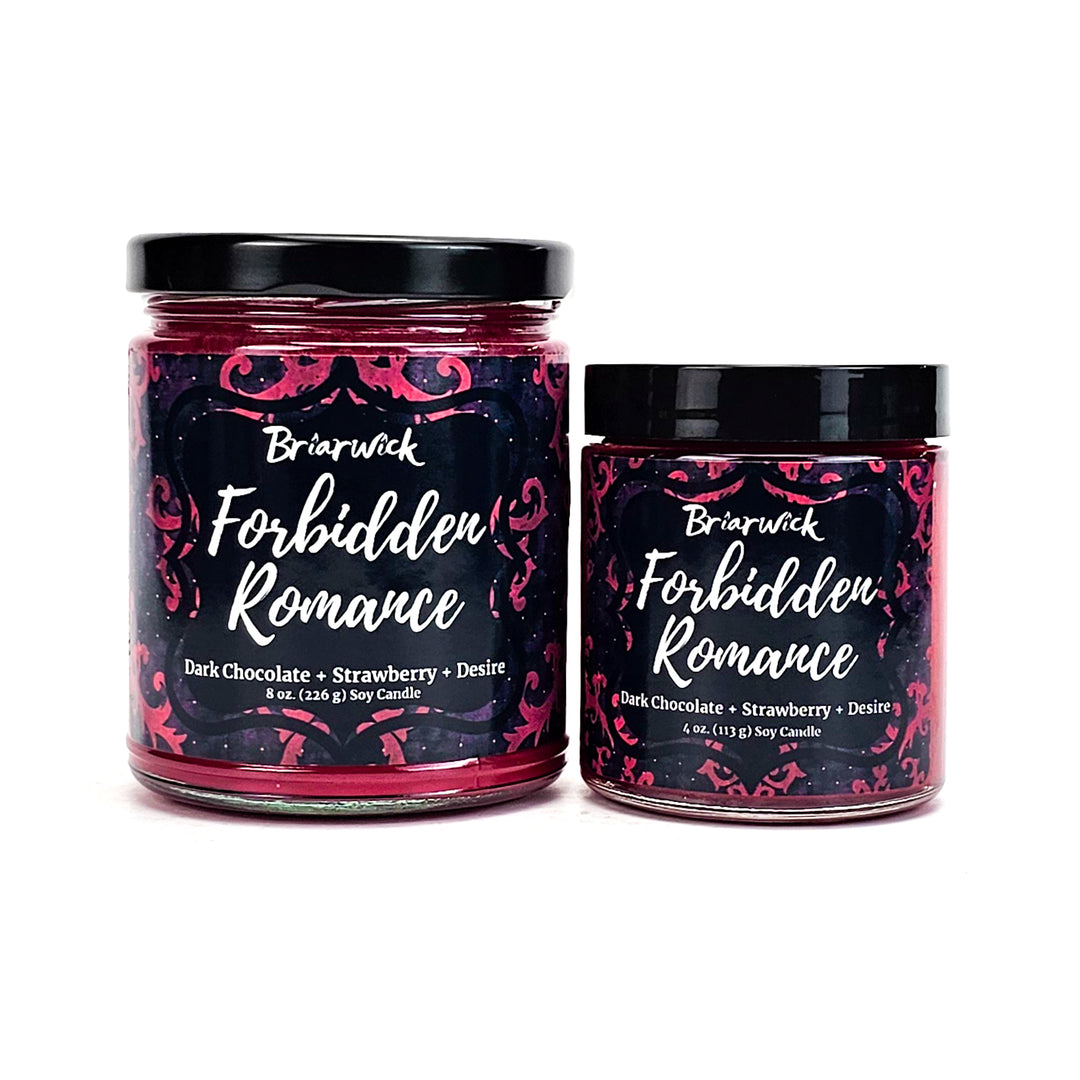 Forbidden Romance 8oz & 4oz burgundy candles with red ornamental designs on a white background