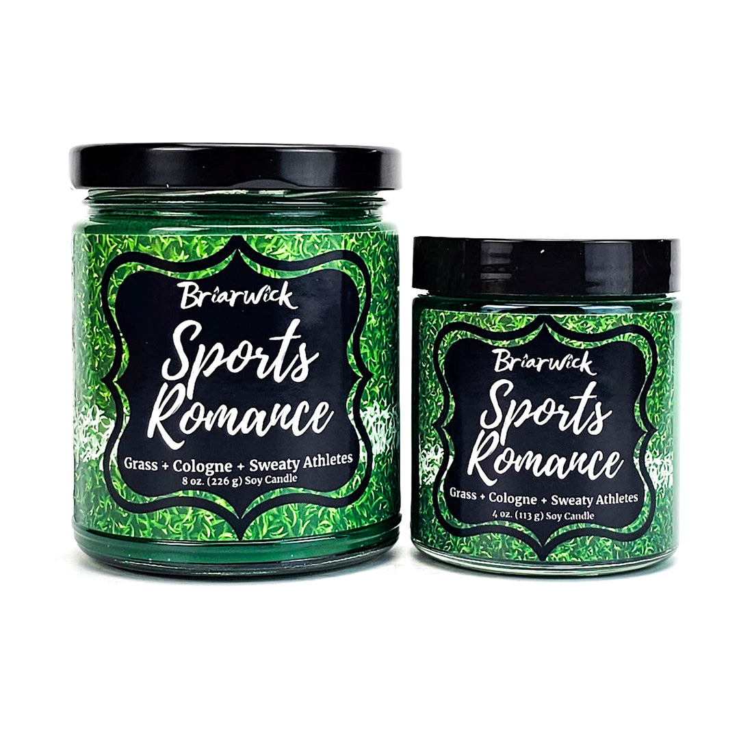 Sports Romance 8oz & 4oz dark green candles with sports field designs on a white background