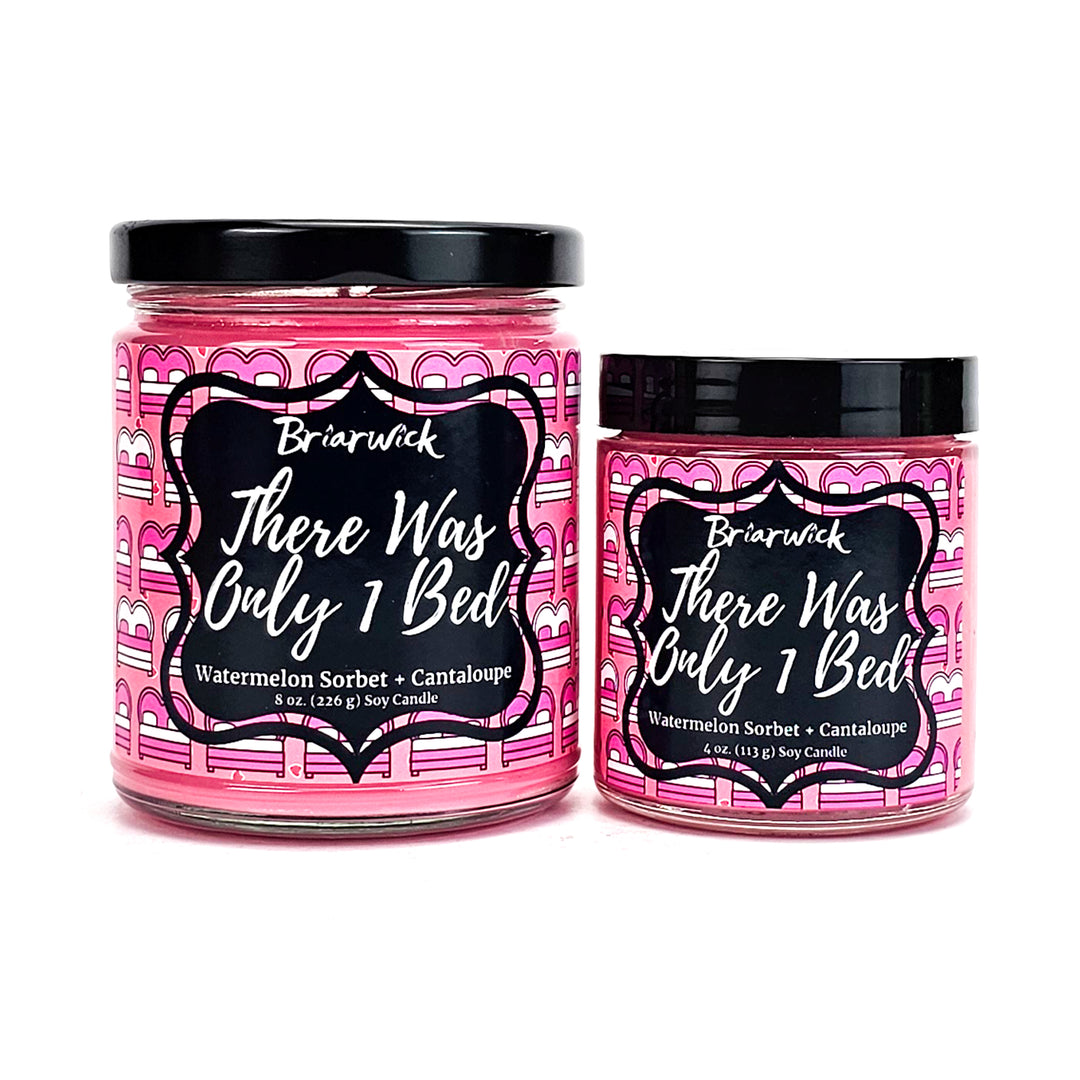 There Was Only 1 Bed 8oz & 4oz bubblegum pink candles with pink bed designs on a white background