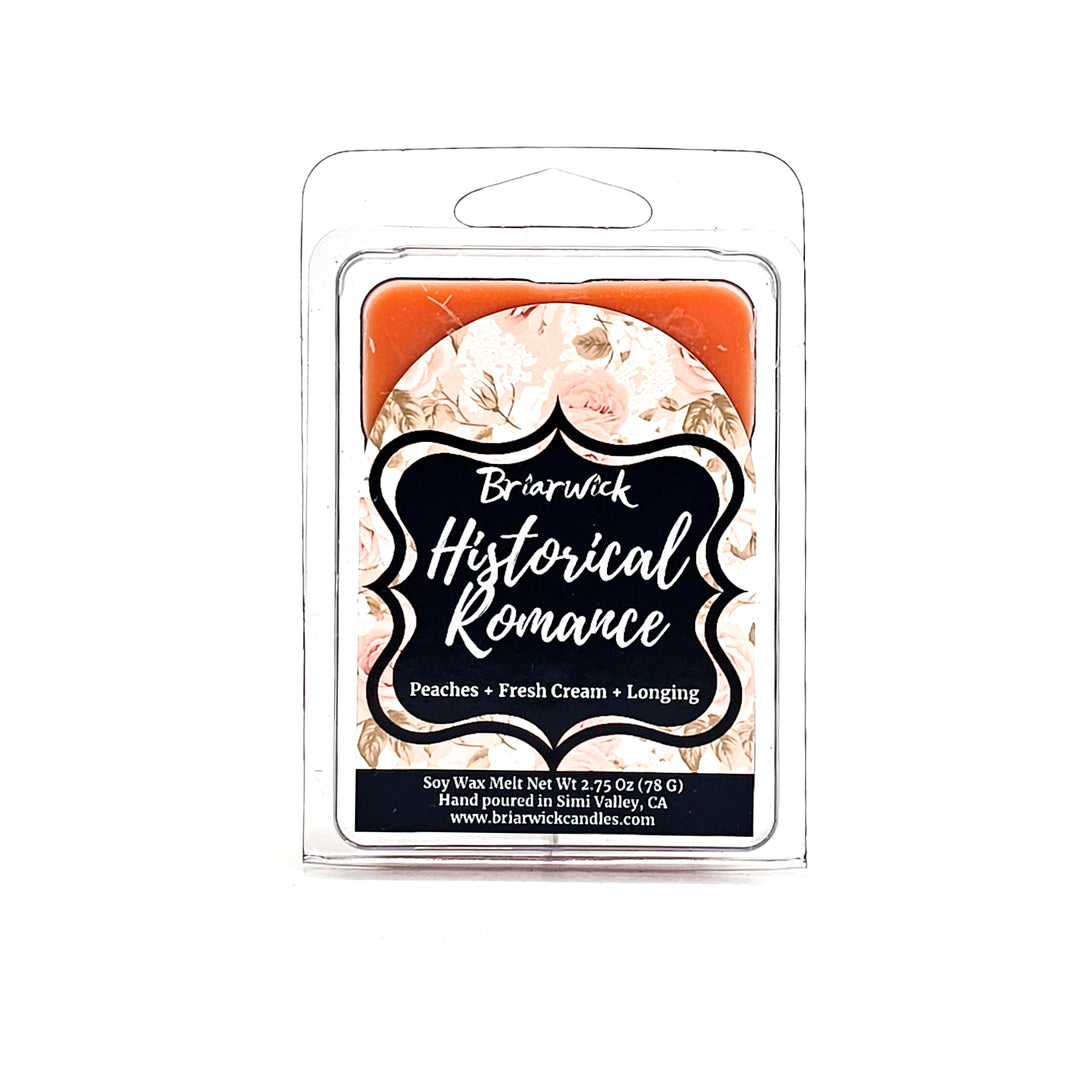 Historical Romance 2oz dusty orange Wax Melt with pale orange floral design on a white background