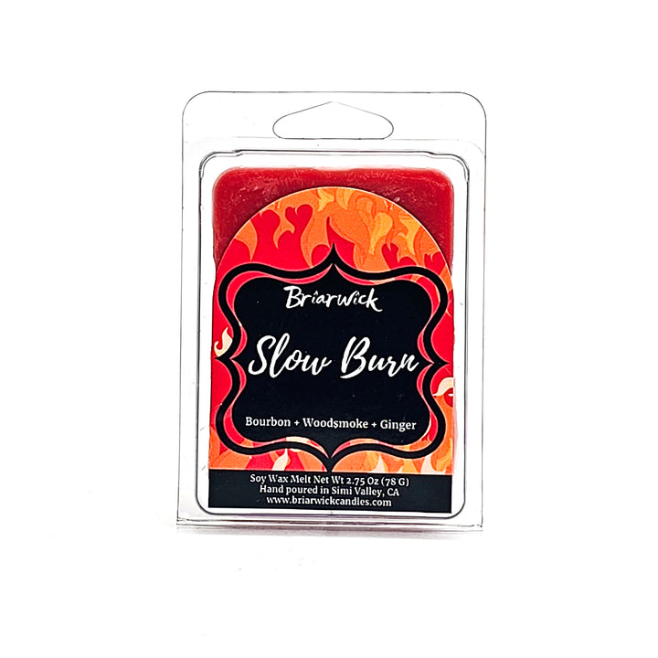 Slow Burn 2oz persimmon Wax Melt with orange flame design on a white background